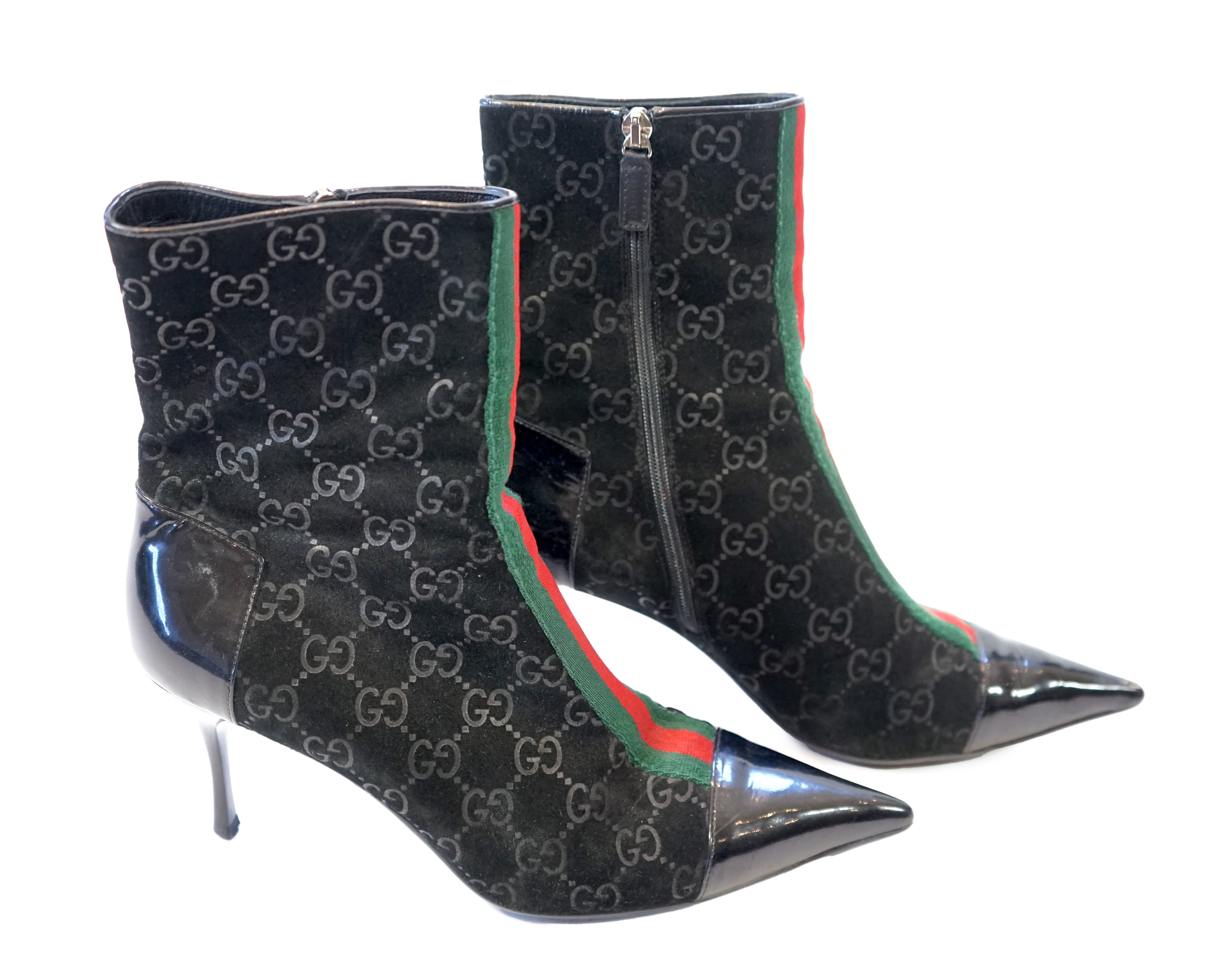 A pair of Gucci monogram pattern and ribbon black lady's suede ankle boots, size EU 38.5